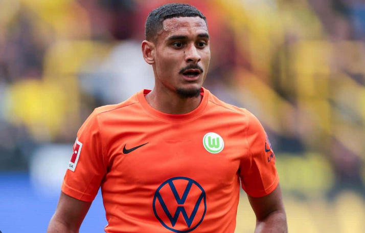 Maxence Lacroix stands on the field during a match amid rumors of a summer transfer to Dortmund.
