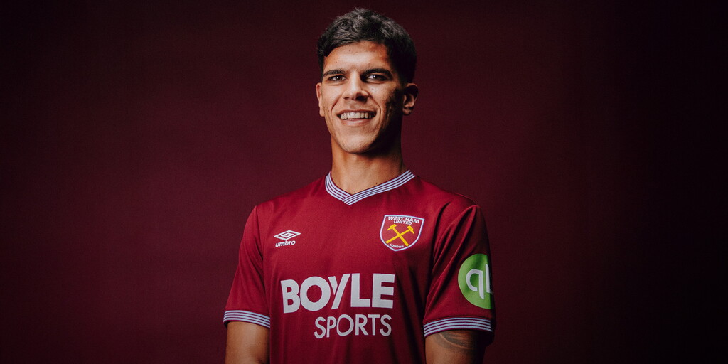 Mateus Fernandes poses in West Ham kit after £38m signing from Southampton 2025