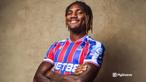 Christantus Uche wearing Crystal Palace FC kit official photo 2025