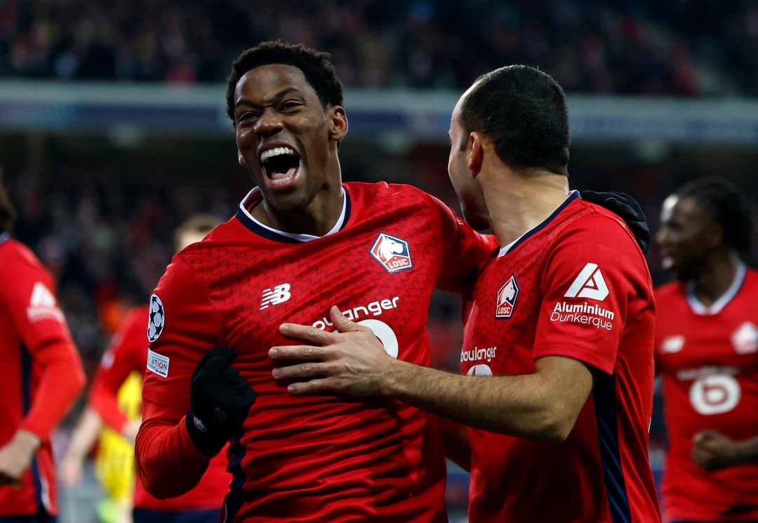 Jonathan David celebrating a goal wearing Juventus football club kit in 2025