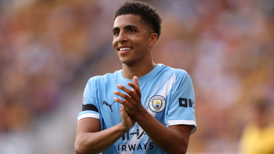 Rico Lewis celebrating for Manchester City during a football match