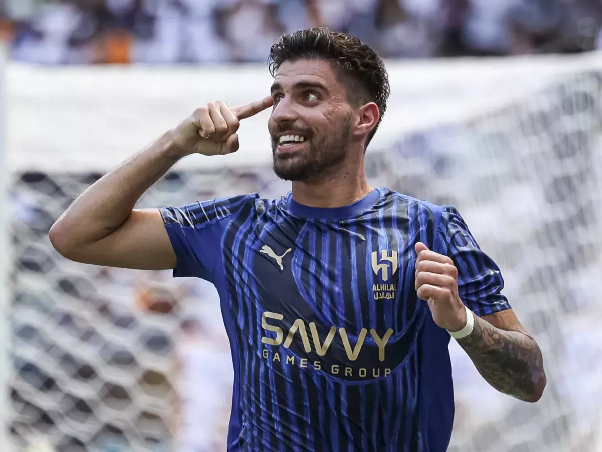 Ruben Neves playing football in blue Al-Hilal kit