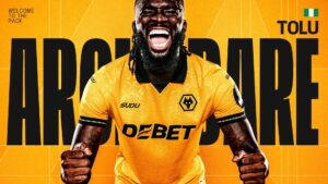 Tolu Arokodare in Wolves home kit at signing announcement